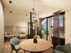 Esstisch und Wohnzimmer in der Penthouse Suite des Hotel Churfürstenhof Bad Birnbach
