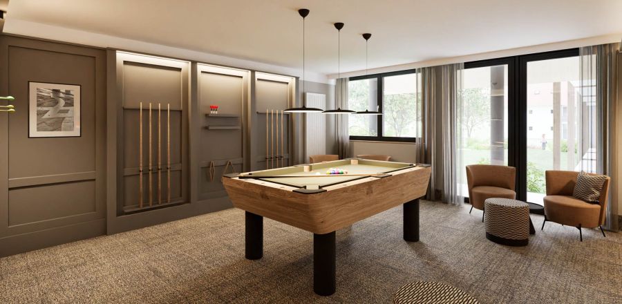 Lounge mit Billardtisch, Queue-Wandschränken und Sesseln im Hotel Churfürstenhof