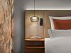 Zimmer Prinzess im Wellnesshotel Churfürstenhof: Bett mit stoffbezogenem Kopfteil, Pendelleuchte und Nachtablage