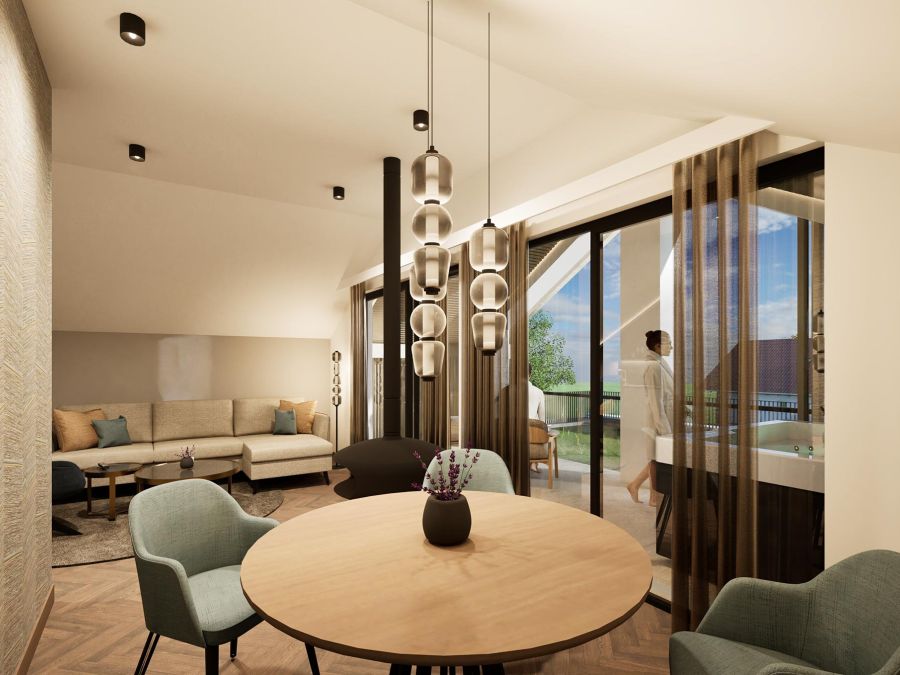 Esstisch und Wohnzimmer in der Penthouse Suite des Hotel Churfürstenhof Bad Birnbach