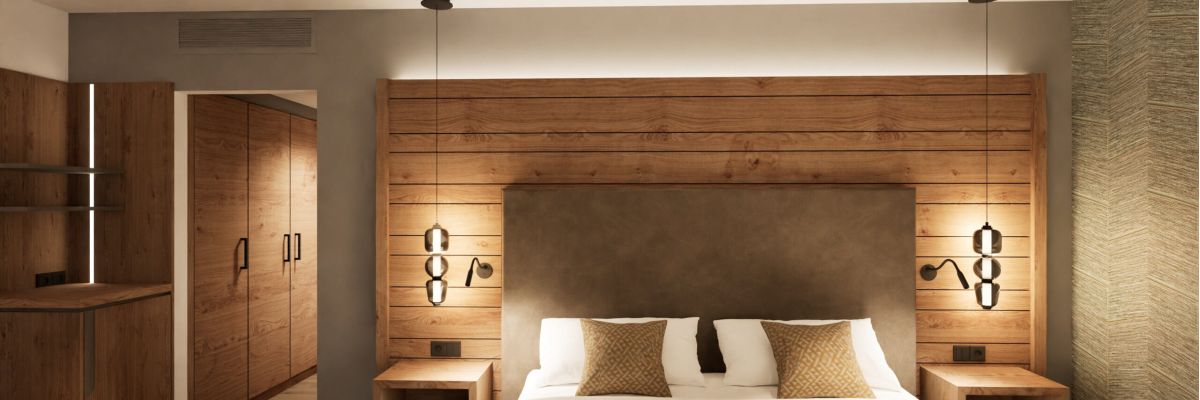 Junior Suite im Hotel Churfürstenhof: Doppelbett vor Holz-Kopfteil mit Pendelleuchten (Visualisierung)